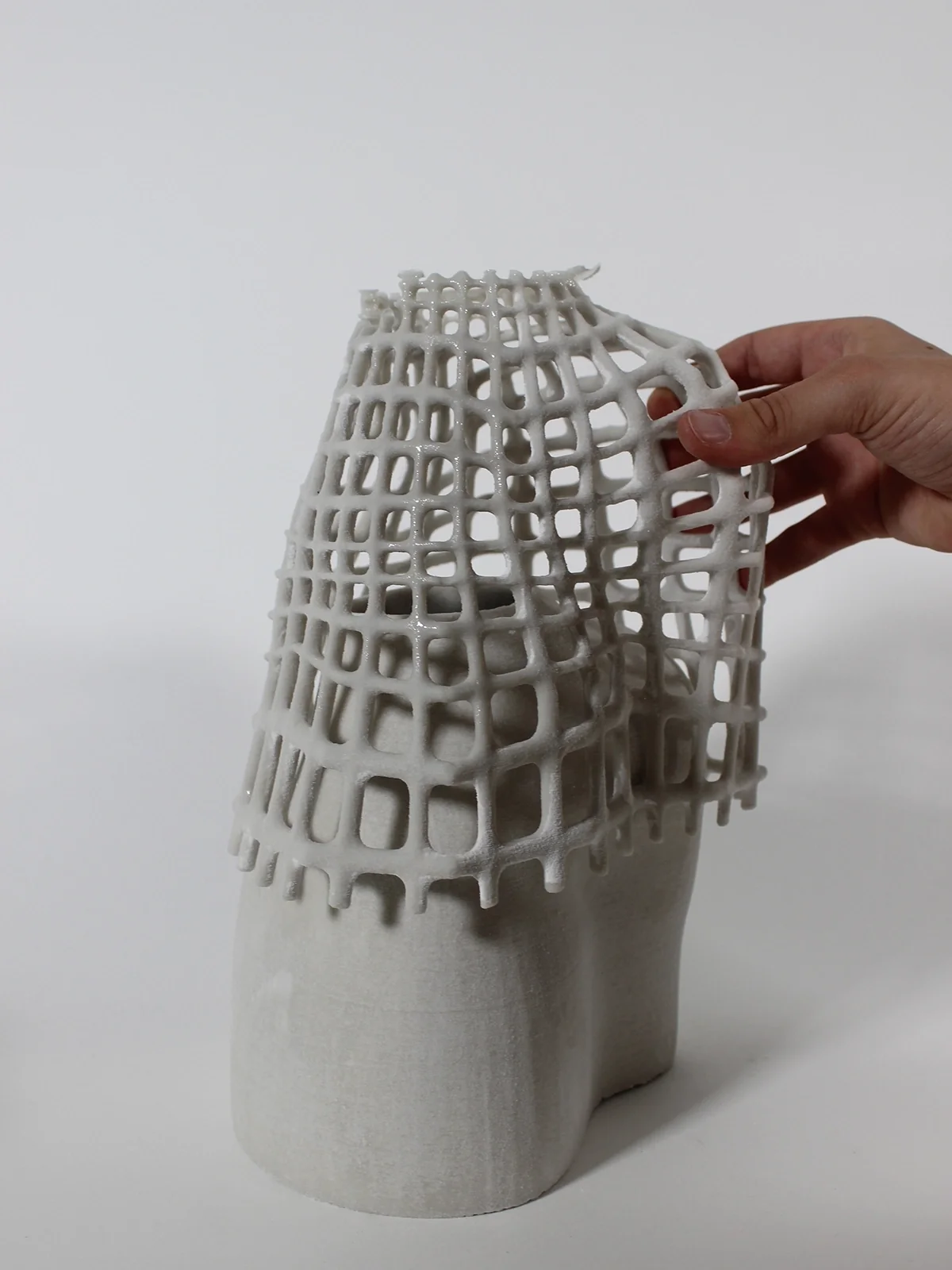 Pièce imprimée en 3D : résille céramique sur une base pleine