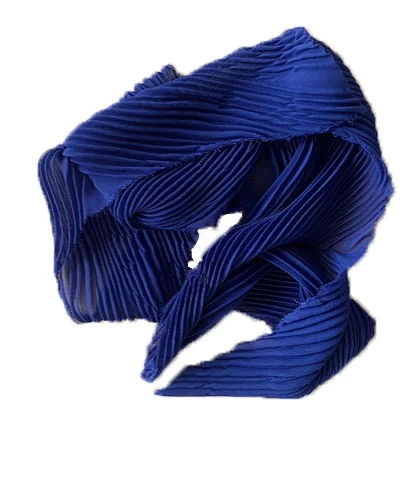 Arashi shibori : tissu enroulé et teint